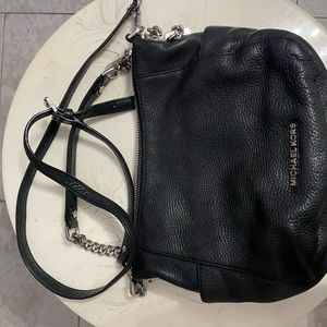 Leather Michael Kors cross body bag.